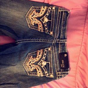 One pair of grace size 25 and miss me size 25